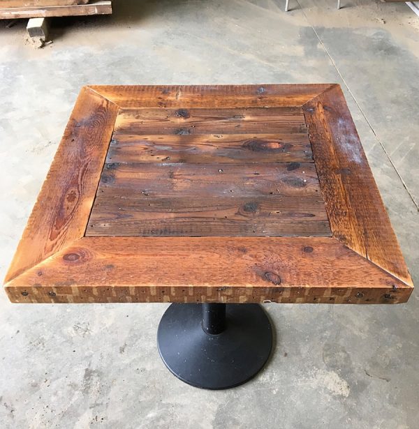 Reclaimed timber table metal base