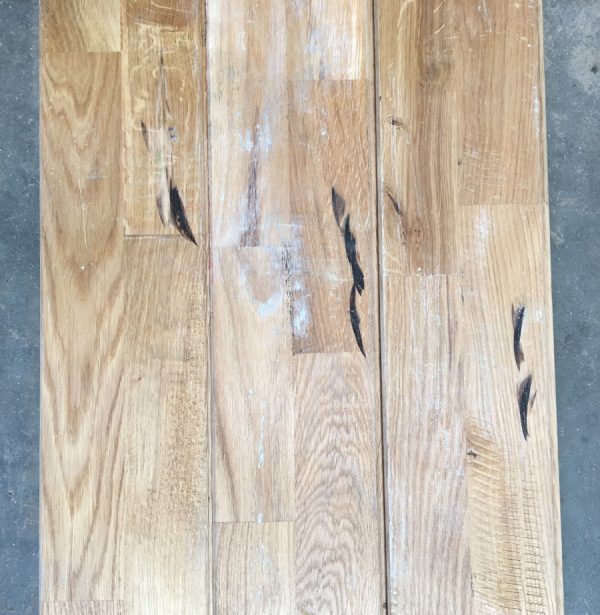 Reclaimed oak strip gym floor (rear of boards)