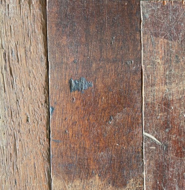 Reclaimed mahogany strip flooring (lightly sanded section)